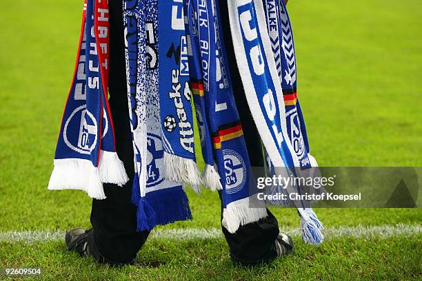 Scarves of a fan of Schalke are seen during the Bundesliga match between FC Schalke 04 and Bayer Leverkusen at the Veltins Arena on October 31, 2009...