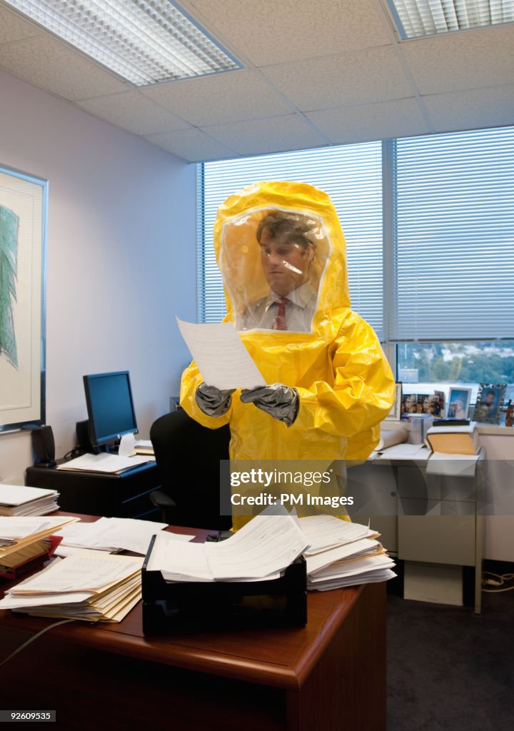 Businessman in Hazmat suit