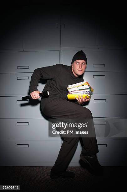 business office burglar - burglary stock pictures, royalty-free photos & images