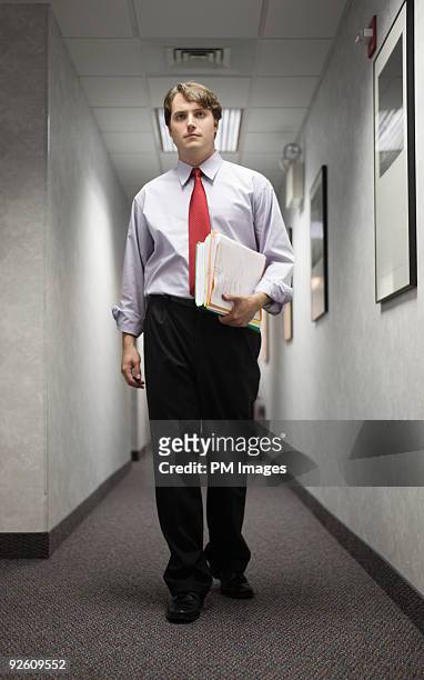 businessman in corridor  - will files stock pictures, royalty-free photos & images