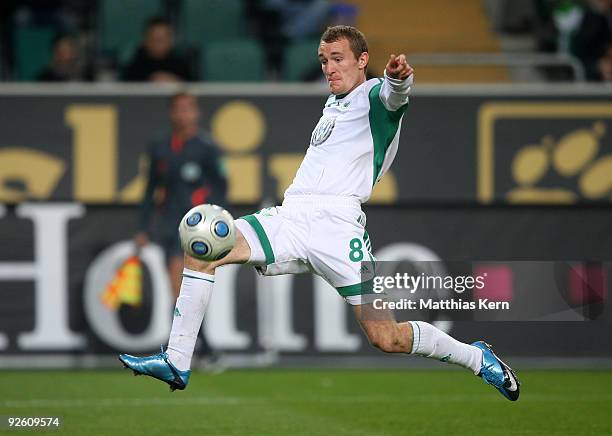 Thomas Kahlenberg of Wolfsburg runs with the ball during the Bundesliga match between VFL Wolfsburg and FSV Mainz 05 at the Volkswagen Arena on...