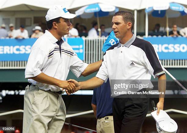 Scott Gardiner from Australia, congratulates Sergio Garcia from Spain, after finishing their second round match of the 2001 Ericsson Masters, which...