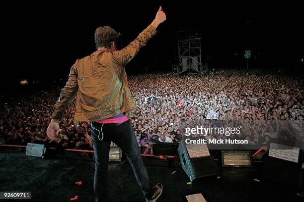 View from the back of the stage showing Tom Chaplin of Keane performing in front of a large outdoor audience at Club Ciudad on March 7th, 2009 in...