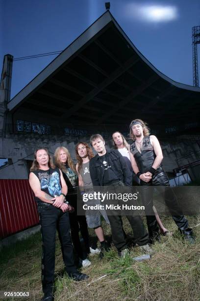 Dave Murray, Janick Gers, Steve Harris, Bruce Dickinson, Nicko McBrain and Adrian Smith of Iron Maiden pose for a group portrait at the Lokomotiv...