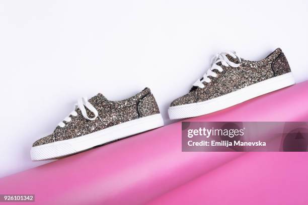 glittery sneakers - glitter shoes stock pictures, royalty-free photos & images