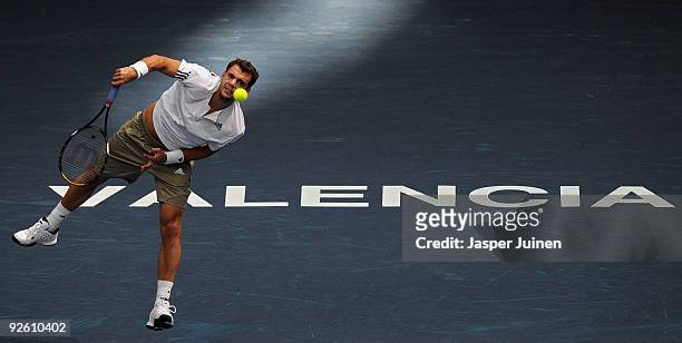 Paul-Henri Mathieu of France serves the ball in his first round match against Tomas Berdych of the Czech Republic during the ATP 500 World Tour...