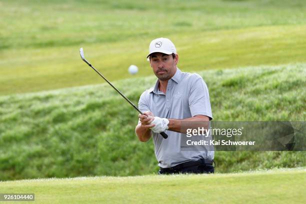 Former New Zealand cricketer Stephen Fleming plays a bunker shot during day two of the ISPS Handa New Zealand Golf Open at The Hills Golf Club on...