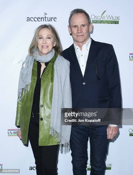 Catherine O'Hara and Bo Welch attend the 13th Annual Oscar Wilde Awards at Bad Robot on March 1, 2018 in Santa Monica, California.