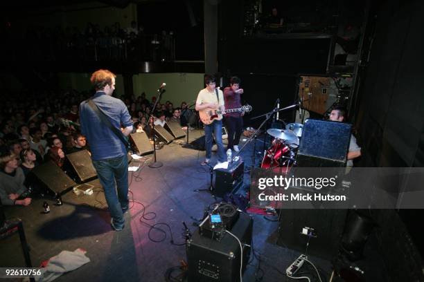 View from the back of the stage showing Chris Baio, Ezra Koenig and Rostam Batmanglij of Vampire Weekend performing at The Bowery Ballroom on January...