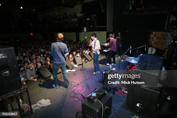 View from the back of the stage showing Chris Baio, Ezra Koenig and Rostam Batmanglij of Vampire Weekend performing at The Bowery Ballroom on January...