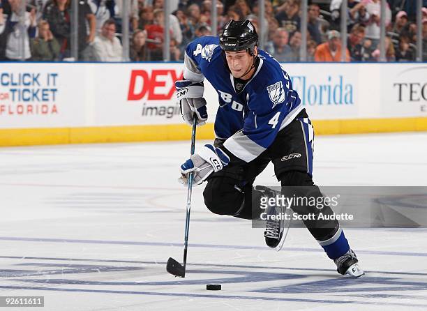Vincent Lecavalier of the Tampa Bay Lightning skates with the puck against the Buffalo Sabres at the St. Pete Times Forum on October 24, 2009 in...