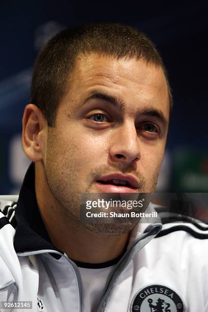 Joe Cole of Chelsea speaks at the Press Conference prior to the Champions League Group D match between Atletico Madrid and Chelsea at the Vicente...