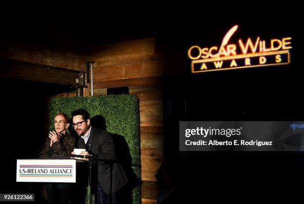 Kathy Griffin and J.J. Abrams speak onstage during the Oscar Wilde Awards 2018 at Bad Robot on March 1, 2018 in Santa Monica, California.