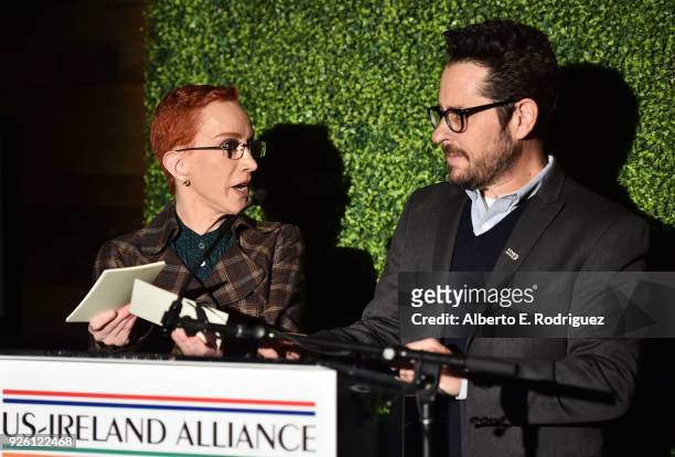 Kathy Griffin and J.J. Abrams speak onstage during the Oscar Wilde Awards 2018 at Bad Robot on March 1, 2018 in Santa Monica, California.