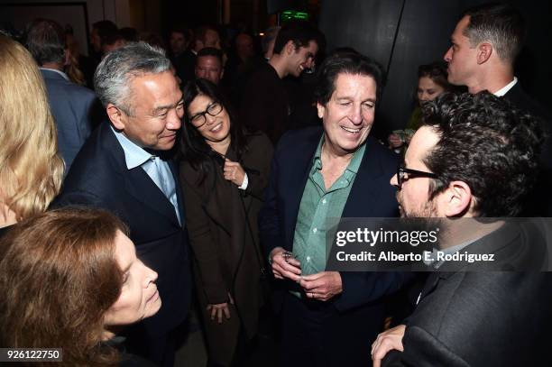 Warner Bros. Entertainment CEO Kevin Tsujihara, Sandy Tsujihara, Warner Bros. Television Group CCO Peter Roth, and J.J. Abrams attend the Oscar Wilde...