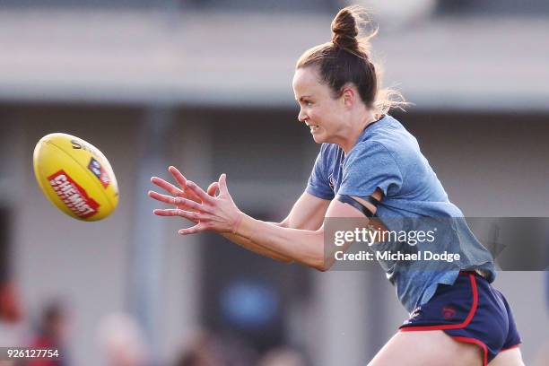 Daisy Pearce of the Demons marks the ball in the warm up during the round five AFLW match between the Melbourne Demons and the Brisbane Lions at...