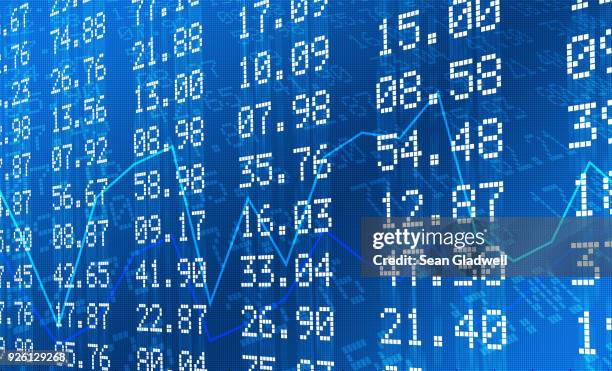 stock exchange graph and numbers - aerial views of british columbias capital ahead of gdp figures stockfoto's en -beelden