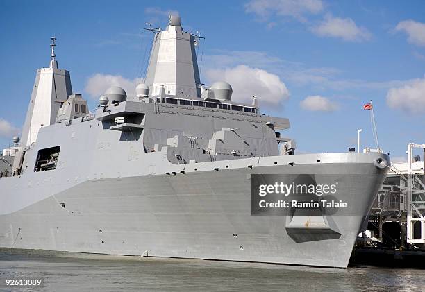 The amphibious transport dock ship, the soon to be commissioned USS New York docks at pier 88 on the west side of Manhattan during an arrival...