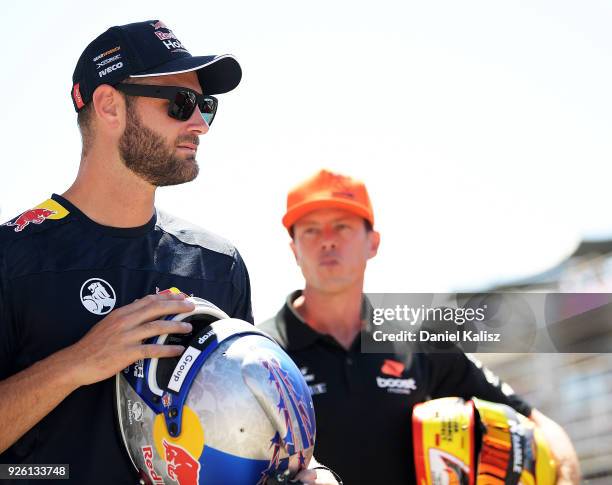 Shane Van Gisbergen driver of the Red Bull Holden Racing Team Holden Commodore ZB and James Courtney driver of the Mobil 1 Boost Mobile Racing Holden...