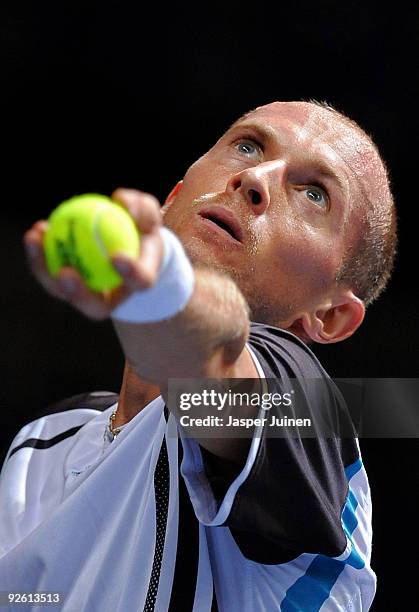 Nikolay Davydenko of Russia serves the ball in his first round match against Alejandro Falla of Colombia during the ATP 500 World Tour Valencia Open...