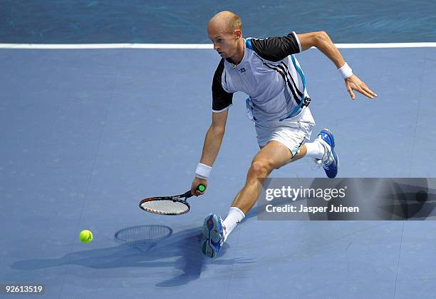 Nikolay Davydenko of Russia jumps to return a backhand in his first round match against Alejandro Falla of Colombia during the ATP 500 World Tour...