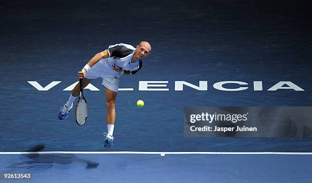 Nikolay Davydenko of Russia serves the ball in his first round match against Alejandro Falla of Colombia during the ATP 500 World Tour Valencia Open...