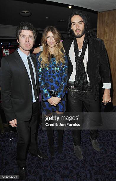 Noel Gallagher from Oasis, Sara MacDonald and Russell Brand attend the Music Industry Trusts' Awards at The Grosvenor House Hotel on November 2, 2009...