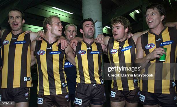 Hawthorn players sing the club song after winning the round six AFL match between the Hawthorn Hawks and the Adelaide Crows, played at York Park in...