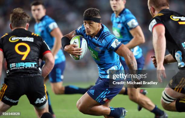 Augustine Pulu of the Blues makes a break during the round two Super Rugby match between the Blues and the Chiefs at Eden Park on March 2, 2018 in...