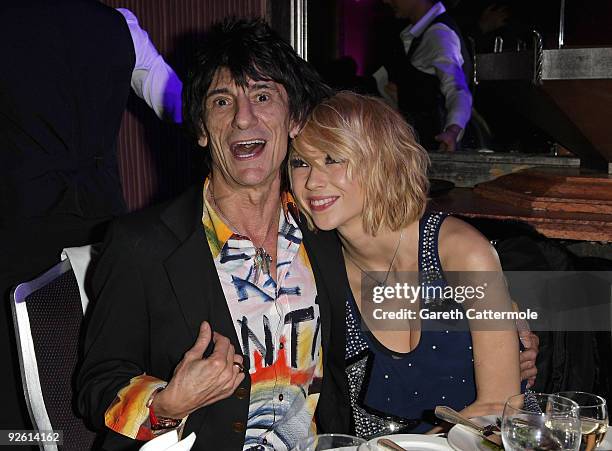 Ronnie Wood from the rock group the Rolling Stones and Ekaterina Ivanova during the Classic Rock Roll Of Honour Awards at the Park Lane Hotel on...