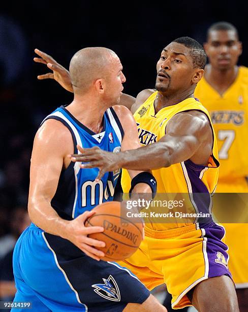 Ron Artest of the Los Angeles Lakers defends against jason Kidd of the Dallas Mavericks during the second quarter of the NBA basketball game at...