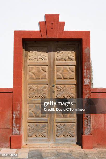 carved wooden door, teguise, lanzarote, canary islands, spain - spanish-colonial-architecture stock pictures, royalty-free photos & images