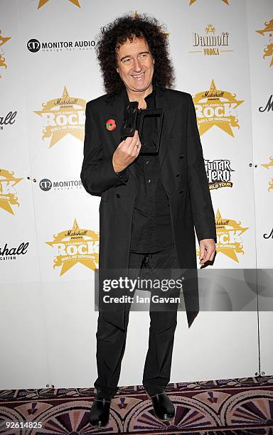 Guitarist Brian May of the rock group Queen attends the Classic Rock Roll Of Honour Awards at the Park Lane Hotel on November 2, 2009 in London,...