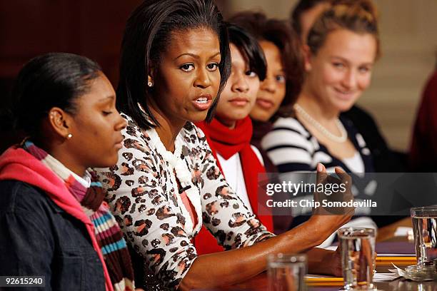 First lady Michelle Obama speaks to a group of female students during an event to kick off a White House leadership and mentoring initiative in the...