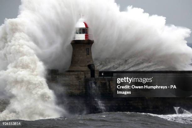 Giant waves crash over Souter Lighthouse in South Shields in Tynemouth, as extreme weather has continued to wreak havoc across the UK.