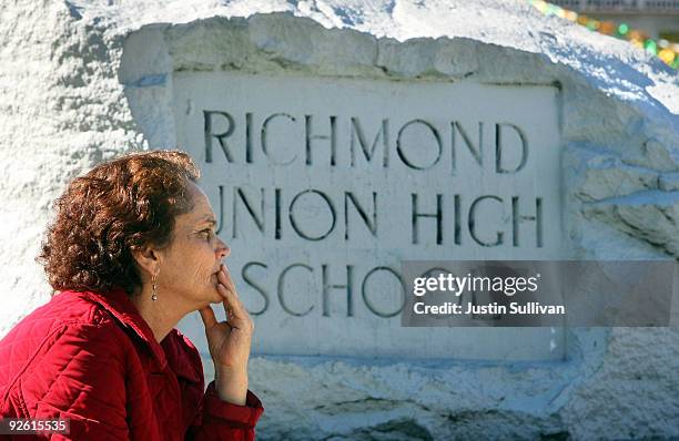 Woman looks on during a prayer vigil for a fifteen year-old rape victim in front of Richmond High School November 2, 2009 in Richmond, California....