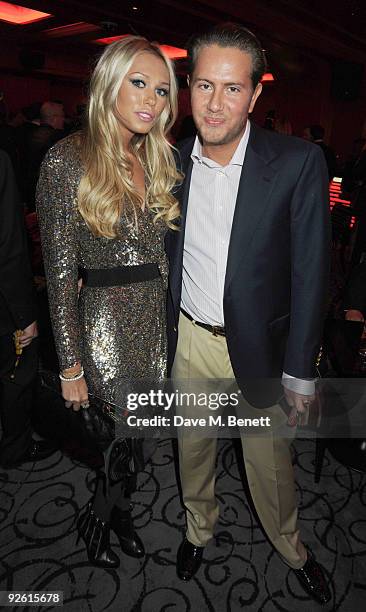 Petra Ecclestone and James Stunt attend the opening party of The Red Room, on November 2, 2009 in London, England.