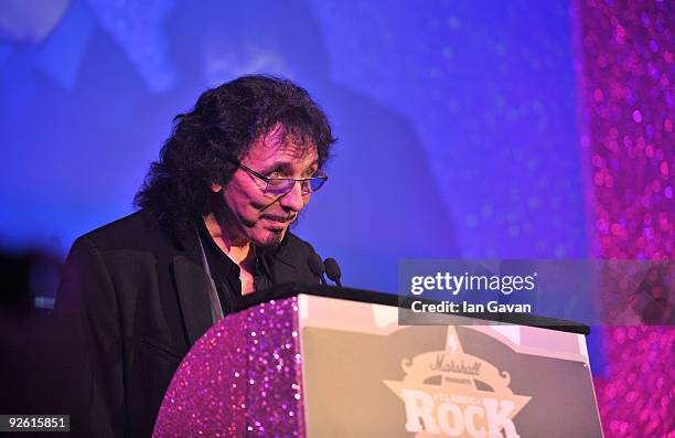 Tony Iommi from the rock group Black Sabbath receives the Best ReIssue award onstage during the Classic Rock Roll Of Honour Awards at the Park Lane...