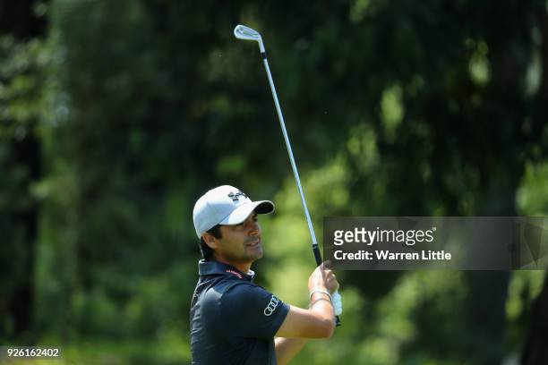 Felipe Aguilar of Chile plays his second shot into the 13th green during the second round of the Tshwane Open at Pretoria Country Club on March 2,...