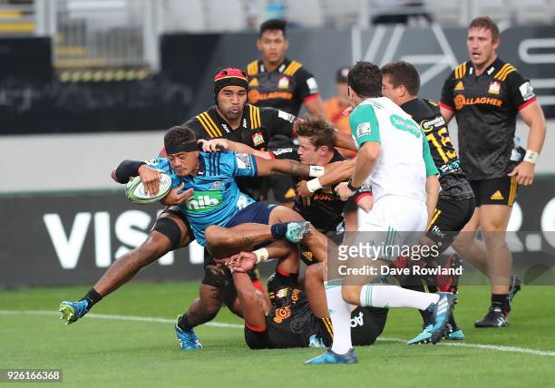 Captain Augustine Pulu of the Blues goes over to score a try during the round two Super Rugby match between the Blues and the Chiefs at Eden Park on...