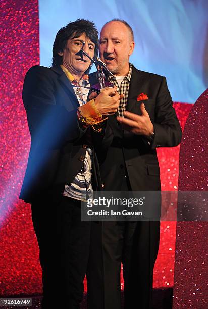 Ronnie Wood from the rock group the Rolling Stones with his Outstanding Contribution award onstage with Pete Townshend during the Classic Rock Roll...