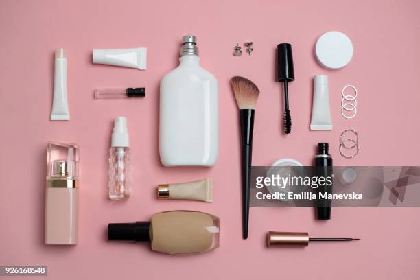 makeup bag with variety of beauty products - still life foto e immagini stock
