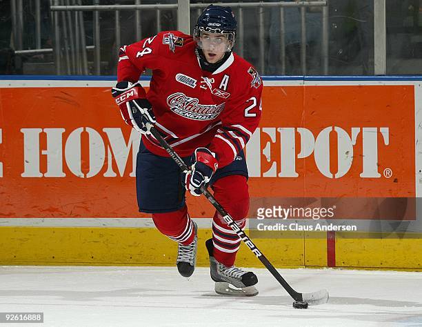 Calvin de Haan of the Oshawa Generals skates with the puck in a game against the London Knights on October 30, 2009 at the John Labatt Centre in...