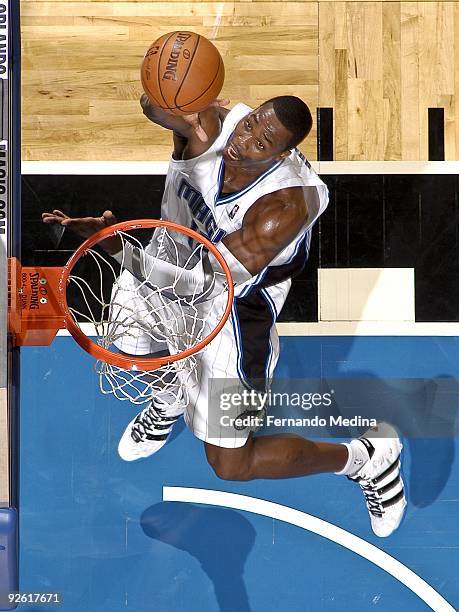 Dwight Howard of the Orlando Magic shoots against the Atlanta Hawks during a pre-season game on October 23, 2009 at Amway Arena in Orlando, Florida....