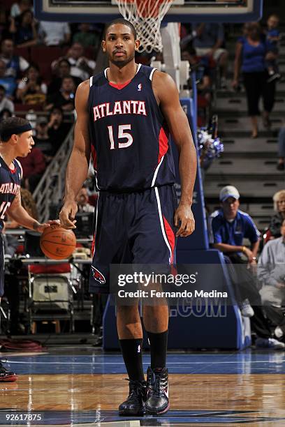 Al Horford of the Atlanta Hawks stands on the court during the pre-season game against the Orlando Magic on October 23, 2009 at Amway Arena in...