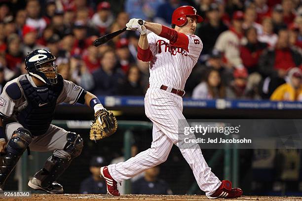 Chase Utley of the Philadelphia Phillies hits a 3-run home run in the bottom of the first inning against the New York Yankees in Game Five of the...