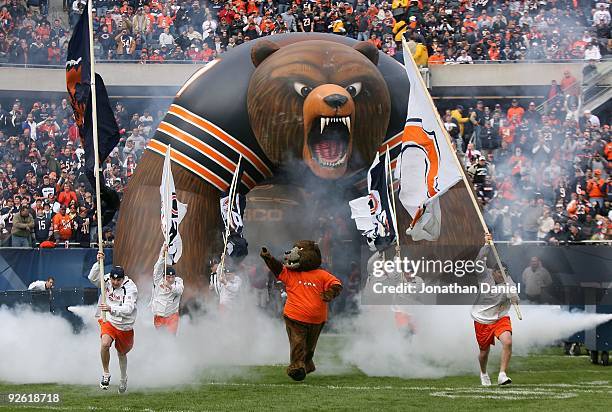 The Chicago Bear mascot, "Staley," runs onto the field during player introductions before a game against the Cleveland Browns at Soldier Field on...
