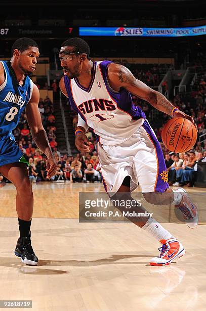 Amar'e Stoudemire of the Phoenix Suns drives against Ryan Gomes of the Minnesota Timberwolves during the game on November 1, 2009 at US Airways...