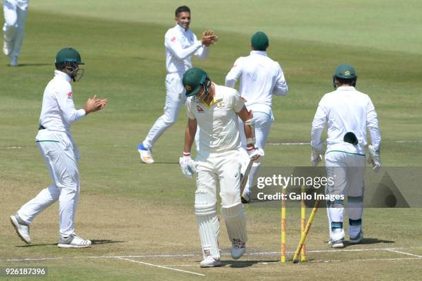 Pat Cummins of Australia bowled by Keshav Maharaj of the Proteas during day 2 of the 1st Sunfoil Test match between South Africa and Australia at...