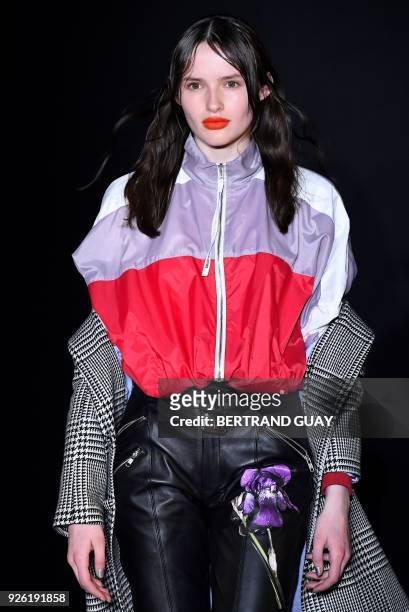 Model presents a creation for Each X Other during the 2018/2019 fall/winter collection fashion show on March 2, 2018 in Paris. / AFP PHOTO / BERTRAND...
